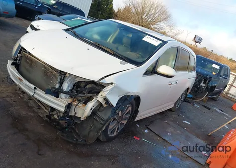 2014 Honda Odyssey Touring/Touring Elite from USA, damaged, VIN 5FNRL5H94EB129494